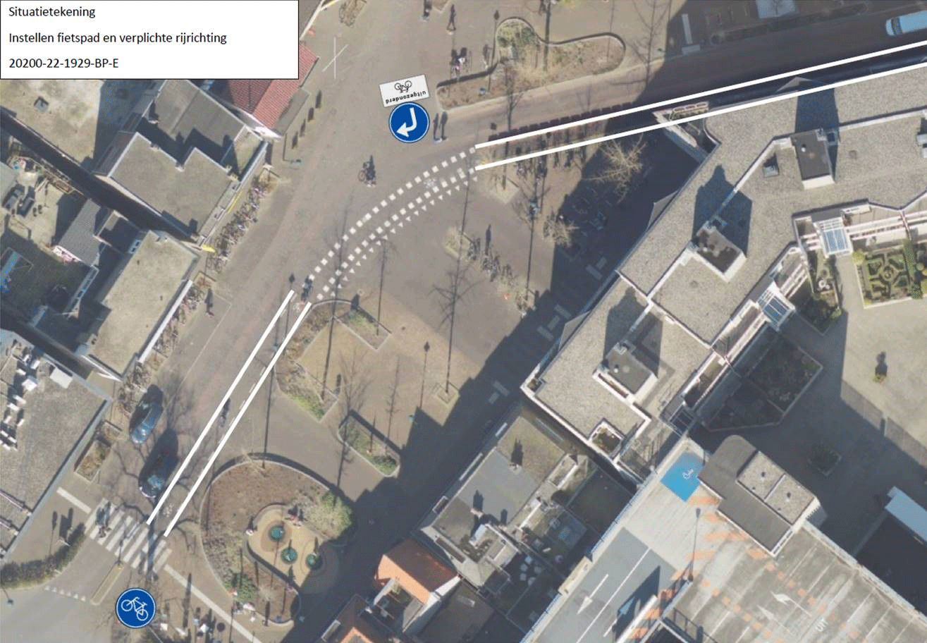 Luchtfoto van situatietekening instellen fietspad en verplichte rijrichting Voorheuvel