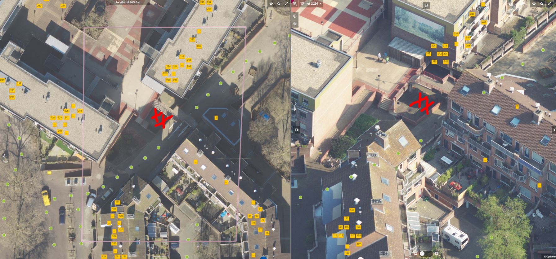luchtfoto De Heuvel met 2 rode kruisen waar e-laadpalen worden geplaatst