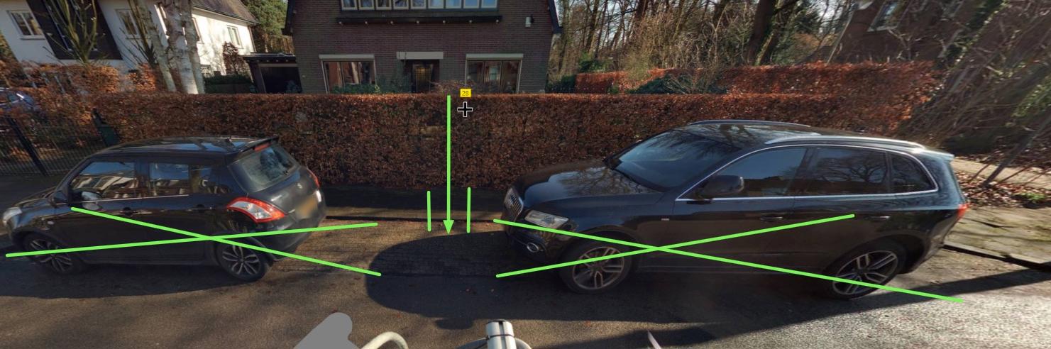 2 getekende groene kruisen op plek waar laadpaal komt