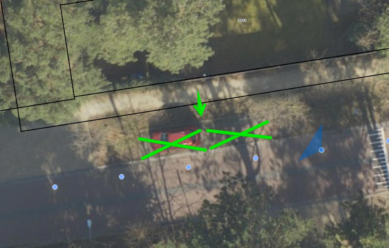 luchtfoto met 2 kruisen waar laadpaal komt