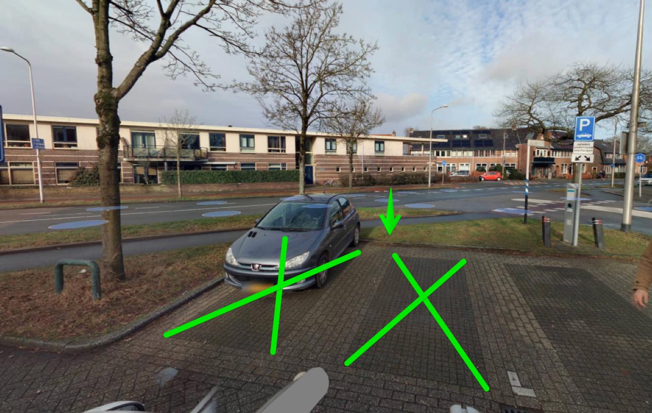 2 kruisen op plek waar laadpaal komt
