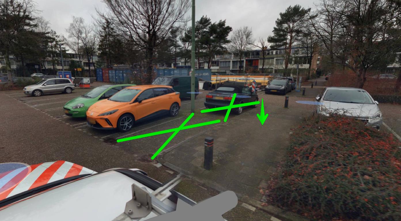 2 getekende groene kruisen op plek waar laadpunten komt