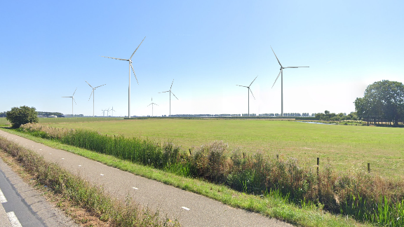 Afbeelding 5.25 Visualisatie 1, bovengrens. Positionering aan de Vogelenzangseweg ten noorden van de infrastructurele bundel. Zicht in oostelijke richting